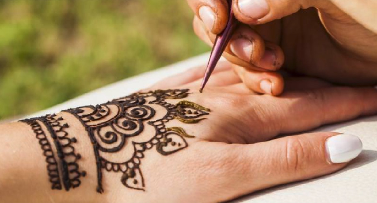 Freestyle henna being applied by hand at Classic Brow